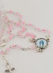 Children's Rosary and Statue of Our Lady of Miracles